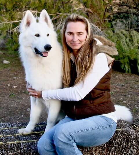 Simona Ridenour and White Swiss Shepherd Simona Ridenour and White Swiss Shepherd sitting